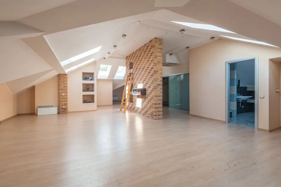 Explore this bright, spacious modern attic apartment with skylights and contemporary design.